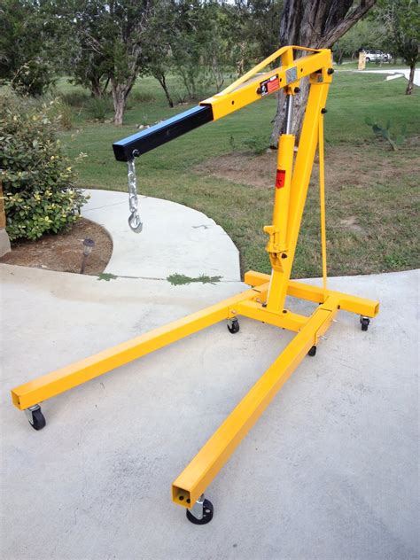 Harbor freight engine crane. Harbor Freight sells the Pittsburgh 2-Ton-Capacity Foldable Shop Crane for under $400. It features an extending boom, adjustable height, and six casters for easy movement once an engine is ready ... 