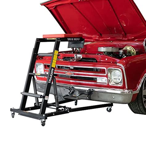 This item: Traxion 3-100 Foldable Topside Automotive Engine Creeper, Red & Black. $32999. +. Traxion 3-102 Topside Creeper Tool Tray. $4000. +. Powerbuilt Heavy Duty Tire Step for Truck, SUV, Non-Slip Steel Surface, Adjustable to Fit Tire, Fold Flat for Storage - 647596 Large. $5999.. 