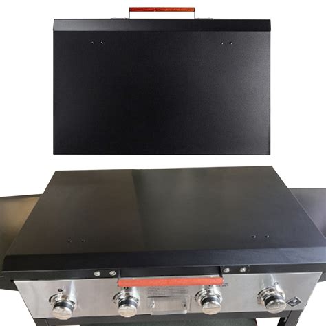 Model: 8175. $32.99. 4.7. (227) Write a review. Keep your Flat Iron 2-Burner Gas Griddle protected from harsh weather year-round with this custom designed cover. Made from heavy-duty material to withstand tearing, fading and wet weather. The lightweight yet durable cover easily slips on, keeping your grill in fighting shape season after season.. 