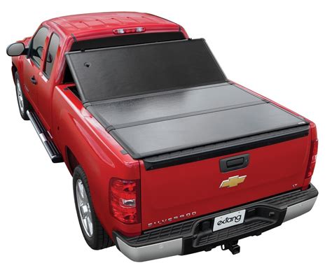 Hard truck bed covers. Provides 100% access to the bed when rolled up. Compact design maximizes visibility through the rear window. Top-mounted buckle straps secures rolled bundle in open position. Locking rail design secures the cover the full length of the bed when closed. Rugged, leather-grained vinyl covering provides a classic tonneau look. 