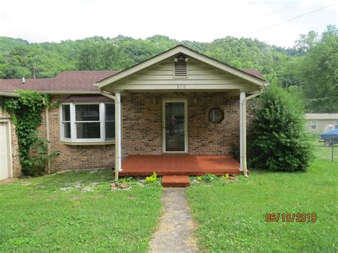 Land for sale in Harlan County, KY. 17,000 dollars, Lot .28 of an acre which is a little over a quarter of an acre, per deed. For sale has temporary power pole, 30 amp service, water tap, sewer,... Harlan Yard Sale | Land for sale in Harlan County, KY. 