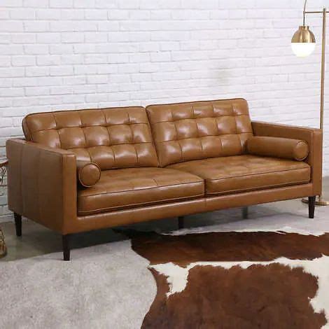 Carvel Leather Power Reclining Sofa with Power Headrest, Teal. $1,299.90 $3,199.98. The Harstine Leather Chair features thick arms, which compliment the tufted seat cushions and back cushions. The frame of this piece is crafted from solid wood and covered with top-grain leather utilized in front-facing pieces and everywhere your body touches .... 