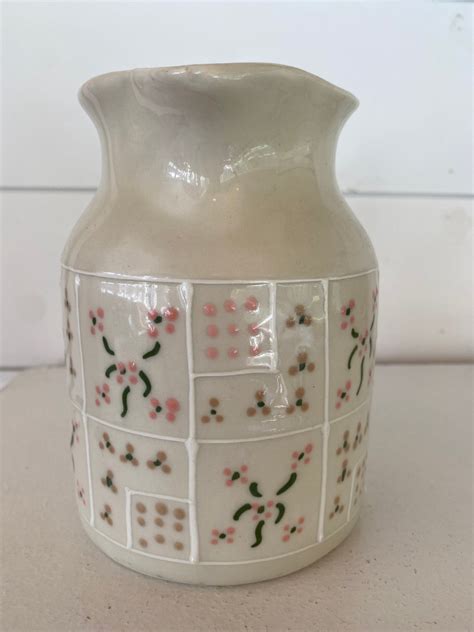 This gorgeous handmade stoneware piece can be put to practical us