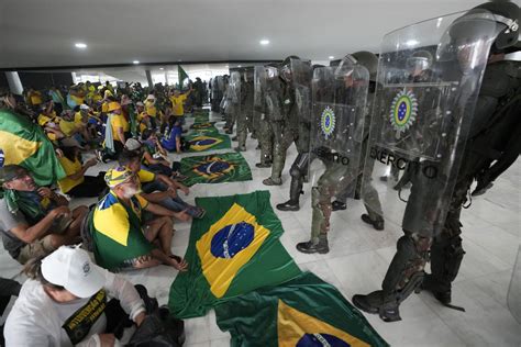 Haunted by post-election riot, Brazil’s Lula reins in army