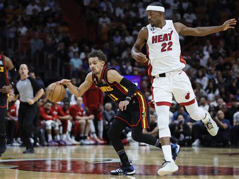 Hawks grab No. 7 seed in East, hold off Heat 116-105