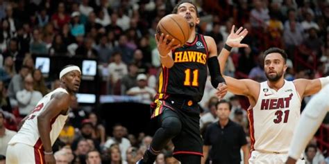 Hawks hold off Heat to grab No. 7 seed in Eastern Conference …