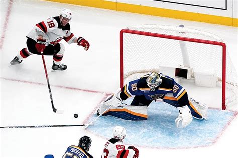 Hayes scores twice to help Blues beat Devils 4-1; Devils lose Jack Hughes to injury