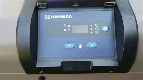 Hayward pool heater says lo. We have a 30,000 gallon salt pool with a Hayward model H400FDN pool heater. The water turns green and the vinyl liner and fiberglass stairs get badly stained. I'm told by 2 pool companies that the hea … 