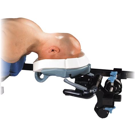 The single use positioning band is an aid in the shape of a cross. It may be used to support the head frame in position on the patient´s head while .... 