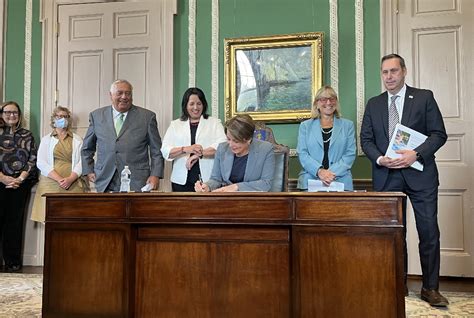 Healey Signs $56 Bil Budget After Going Light on Changes