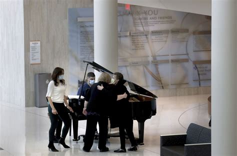 Healing starts in the lobby at this hospital, where volunteer musicians play their passion