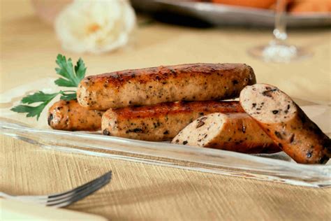 Healthiest sausage. Pork vs. turkey bacon by the numbers. Protein: Each 2-ounce serving of pork or turkey bacon has roughly the same amount of protein. Pork bacon offers 20 grams per serving. Turkey bacon provides 17 ... 