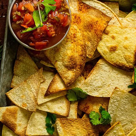 Healthiest tortilla chips. Flour tortillas are a versatile staple in many cuisines, from Mexican to Tex-Mex and beyond. Soft, chewy, and delicious, they are the perfect vessel for a variety of fillings like ... 