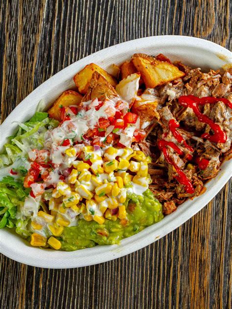 Healthy chipotle bowl. 6. Vegetarian Bowl. The next best bowl at Chipotle is their Vegetarian Bowl. It’s made with a supergreens lettuce blend, brown rice, black beans, fajita veggies, fresh tomato salsa, and guacamole. If you’re not a fan of meat, this is the perfect bowl for you. Grab this in place of any unhealthy lunch item. 7. 