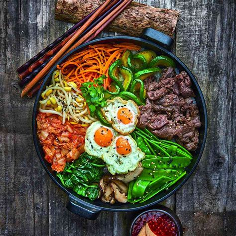 Healthy korean food. Jjajangmyeon. Chimaek. Soy Sauce Crab. 1. Bibimbap (Rice Bowl) Image Source. For those who find comfort in food bowls, Bibimbap will surely leave you filled and comforted. Bibimbap is a tasty mixture of rice, vegetables, beef, gochujang (hot chili paste), and a fried egg seasoned with soy sauce and sesame seeds. 