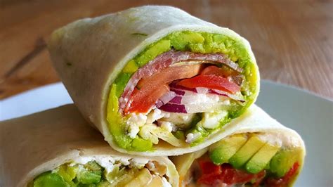 Healthy tortilla wraps. One: Place the salmon on a baking tray and sprinkle with paprika, salt and pepper. Put in a preheated oven at 190°C/375°F/Gas 5 for 12-15 minutes, until the salmon is cooked through. Two: Spread the cream cheese on the wrap and top with lettuce, tomato, carrot, dill and the flaked cooked salmon. Fold up and serve. 