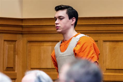 Hearing underway for first of 2 Iowa teens who pleaded guilty in 2021 beating death of teacher