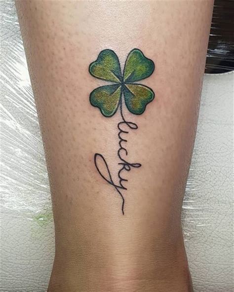 This tattoo symbolizes luck and love, making it a