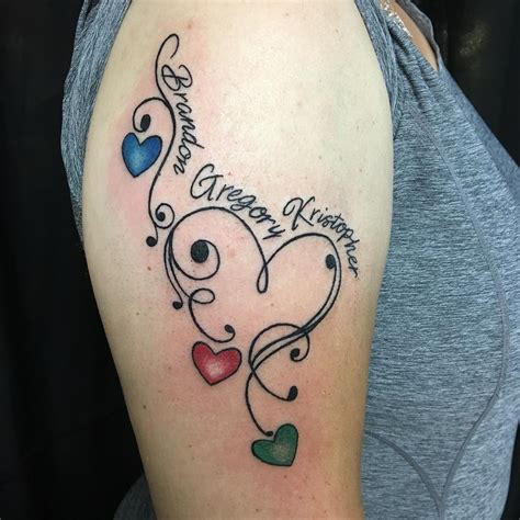 Heart tattoos for grandchildren. The heart is considered a universal symbol for love, and when combined with tattoos, it often symbolizes deepest desire and passion. 14. Semicolon Heart Tattoo. Semicolon tattoos have become a symbol of solidarity, hope, and strength, and it is the right choice for people who are battling with mental health issues. 