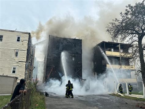 Heavy fire spreads through three residential Mattapan buildings