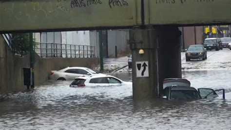 Heavy rains flood Chicago roads and force NASCAR to cut short its downtown street race