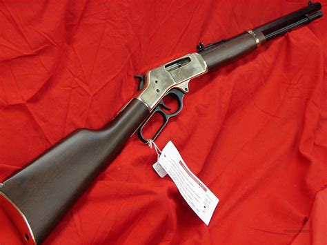 Henry Golden Boy Silver Compact Blued/Nickel Plated Lever Action Rifle - 22 Long Rifle - Based on Henry's Golden Boy, the Silver is a masterpiece of fine crafted gunsmithing. It has a blued octagonal barrel, American walnut stock, and features a silver receiver, buttplate, and barrel band. It has an adjustable buckhorn-type rear sight.. 