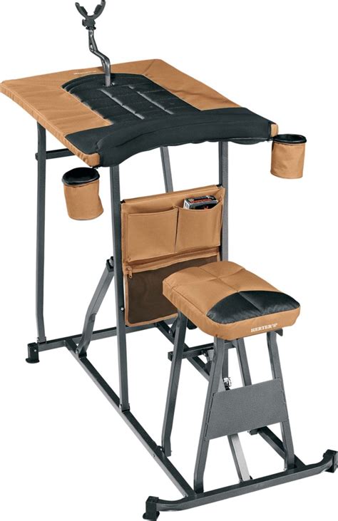 Product Details. The Cabela's® Deluxe Shooting Bench sports a large 34"L x 22.5"W bench, offering ample space to accomodate your firearm, accessories, ammunition, and your unique shooting style. Featuring a corrosion-resistant, powder-coated steel frame, this bench boasts a durable 600-denier material with a raised edge to catch spent brass ... . 