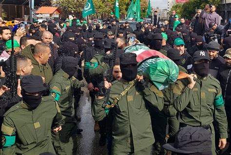 Hezbollah leader says his group must retaliate for suspected Israeli strike in Beirut