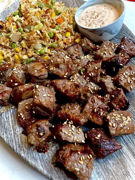 Hibachi steak. Want to learn how to make hibachi at home on the griddle, including how to make chicken teriyaki, fried rice, and zucchini and onions like you get at a Japan... 