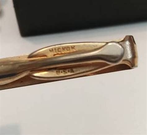 gorgeous and vintage large 2 1/2" SIGNED HICKOK USA goldplated RED AND GREEN ENAMEL tie bar excellent condition shipping is 1.99 from 90350161