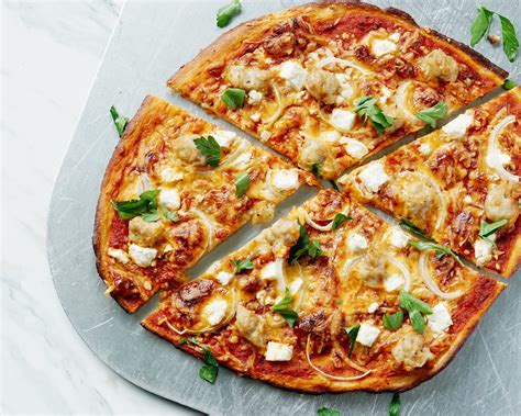 High protein pizza. Chop chicken breast, place in food processor and pulse until torn and ground. Spread on baking sheet and bake for 10-12 minutes to dry out (shake half way). Let cool slightly. Place cauliflower florets in food processor and pulse to form rice. Transfer to large bowl and microwave 10 minutes until tender. 