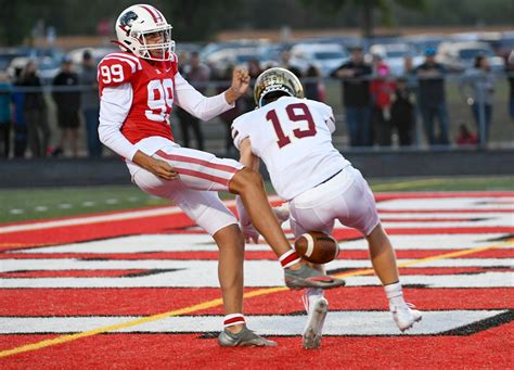 High school football: Lakeville South finds a way to stun rival Lakeville North at end