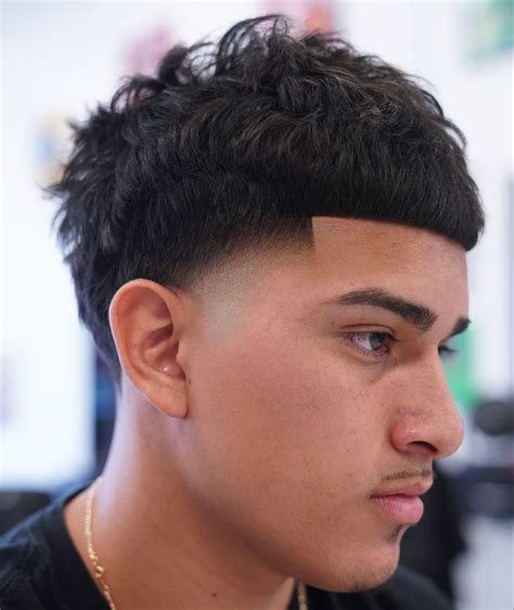High Taper Fade Haircut. In high taper fade haircuts, the hair is cut very short near the top of the head and gets longer as it goes down. ... is a popular style in Mexico and has been dubbed the 'Edgar' or 'Mexican Caesar.' If you want a short, low-maintenance look that is modern and masculine, try a buzz cut with a low skin fade. To .... 