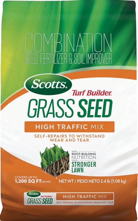 High traffic grass seed. Rake bare patches and sprinkle grass seed mixed with potting soil into the dirt. Cover the area with straw or hay for extra protection. Water the grass daily to encourage new roots. Keep dogs off your newly planted lawn by building a fence or training them to go elsewhere. 1. 