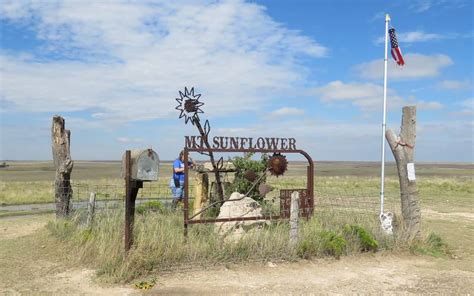 The peak of Mount Sunflower, the highest point in Kansas at 4,039 feet above sea level, is found about 1/2 a mile east of the Kansas border with Colorado.. 