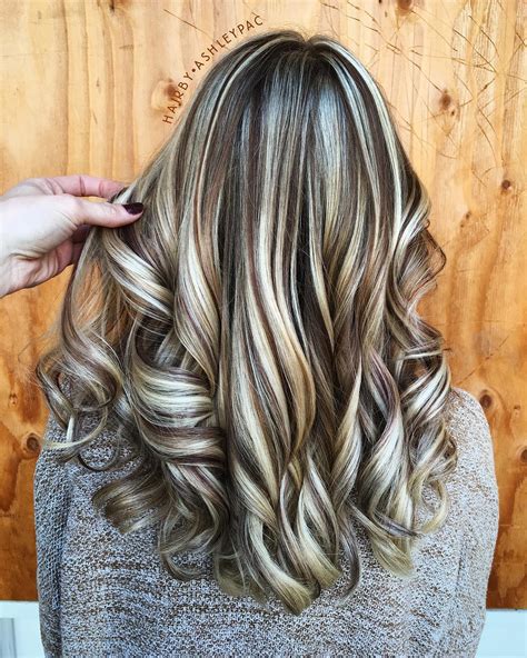 Highlight lowlight hair color ideas. The contrasting shadow root adds so much dimension and shine to this honey-blonde hair color. To avoid brass, make sure you're lathering up with a purple shampoo every couple washes (they're ... 
