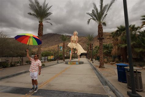 The “Forever Marilyn” statue is framed by storm clouds as Hurricane Hilary heads north toward Southern California, in Palm Springs, on Aug. 19, 2023.. 