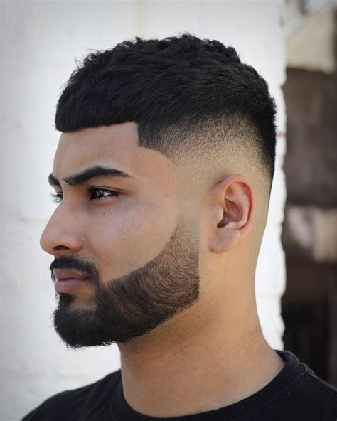 Hispanic haircuts. Short Straight Chili Bowl Haircut. This chili bowl cut looks like it came straight out of a cartoon. The edges are highly straight and every strand of hair is adequately placed. To achieve this look, you need to have your hair straightened. Bleach it platinum blonde and cut the sides with laser-like precision. 