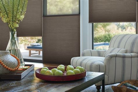 Hiunter-douglas - Hunter Douglas says its design allows the cells in its shades to be larger—this shade has .75-inch cells, but 1.25-inch cells are an available option—while enhancing the shade’s energy ...