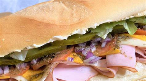 Hoagie grinder sub. It's all about the bread. A sub is made from a 24-or-so inch loaf, a hoagie from a loaf half that size, he says. Even if you slice that sub loaf into halves or quarters, it's still a sub ... 