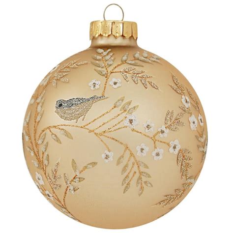 Personalize your Christmas tree display with this Holy Bible Ornament. This glass ornament has been shaped into a realistic Bible. The details and words have been added in a metallic gold with glitter. This piece is the perfect way to display your faith and celebrate the holiday season!. 