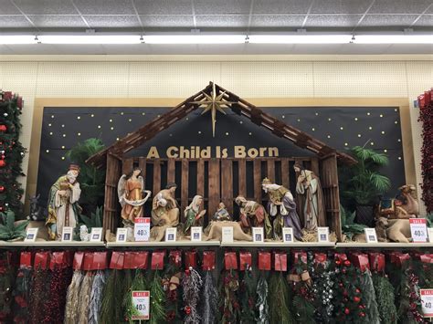 No Christmas is complete without this Black Nativity Metal Decor.&nbsp;It features a Nativity scene cutout set into a rustic wood base. The scene shows Mary and Joseph kneeling beside the manger with a star cutout overtop.&nbsp;Add holiday charm to your home with this sentimental Nativity decor. . 