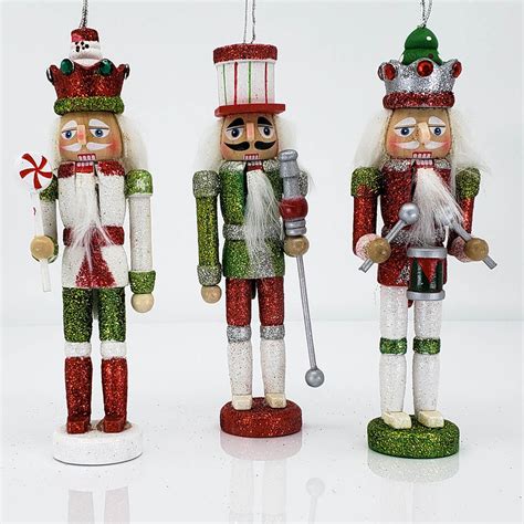Hobby lobby nutcracker ornaments. There is tons of ways you can go about this Colorful DIY Holiday Nutcrackers project. You can make it super easy and spray paint them instead of hand painting them. If your nutcracker comes with hair like mine you can chose to paint around it or there is a way to take it off. I will link At Home With Ashley's tutorial HERE, she chose to ... 