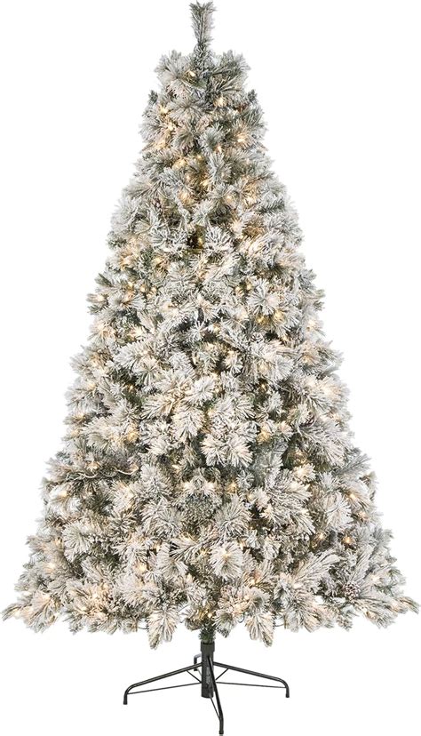 Have a blast with your dearest friends and family as you rock around this Flocked Alpine Pre-Lit Christmas Tree! This faux tree's slender profile makes it perfect for any space where you might need a little more elbow room. The tree's plastic foliage is simple, with broad pine needles. Plus, each branch is flocked from tip to trunk for a snowy look. Whether it's at home or in the office, you .... 