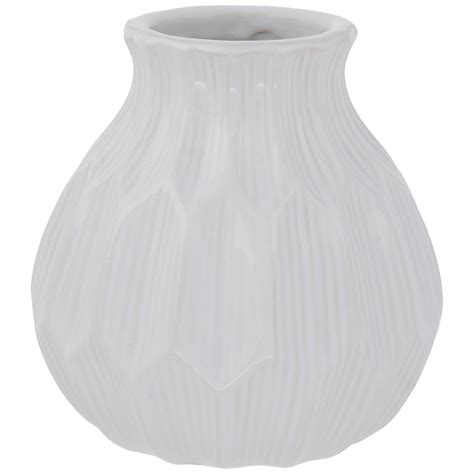 Hobby lobby white vase. Enriching your home decor with simple embellishments is a great way to tie a room together.&nbsp;Gray &amp; White Terracotta Vase has a narrow base that widens then narrows again towards a short, fluted neck.&nbsp;It features a semi-smooth finish with subtle ridges around the center.&nbsp;A spattering of white and textured markings add … 