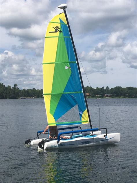 Hobie cat with trailer for sale or trade. -. $700. (Fortville) 16 foot hobie with trailer. Trailer has a picnic table attached. Would consider a trade for a small monohull! She's in pretty good shape. If I remember correctly the sail needs a little work.. 
