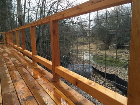 Hog panel deck railing. Deck Railings / Deck Railing Systems. Internet # 324278541. Model # 501887. ... Pre-assembled straight railing panel; Black powder-coated hog wire and pressure ... 