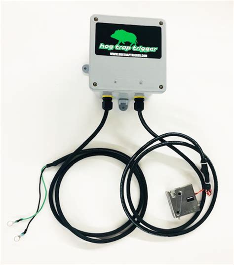 Hog trap trigger mechanism.  This automated trigger mechanism harnesses solar ...