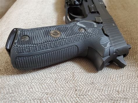 Hogue g10 grips. Hogue’s rubber grips are styled to complement your firearm’s natural aesthetics ; Made from modern durable thermoplastic elastomer, the grips feel soft and resilient in the hand ; They are molded with reinforcing inserts which engage directly with the firearm frame and grip screws for a rock-solid grip-to-frame fit ; 