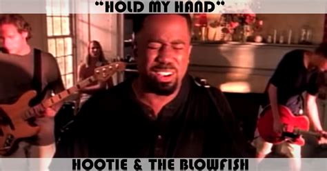 Hold my hand hootie and blowfish. The band helps some kids cross the street 